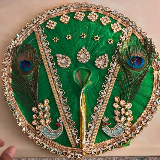 Bhavyaam Hariyali Mayur Vaibhav handcrafted emerald green Laddu Gopal Ji poshak with pearl, kundan and Morpankh detailing and matching designer Mukut for Shravan, Teej and Janmashtami.