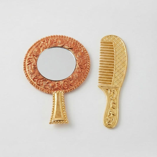 Ornate circular handheld mirror with a floral red-gold frame paired with a matching gold-finish decorative comb for Ladoo Gopal Ji