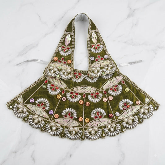 Bhavyaam handcrafted Hariyali Lavanya olive green Mata Rani lehenga patka set with pearl moti work, ruby stone embellishments, and crystal scalloped border for Hariyali Teej and Devi shringar.