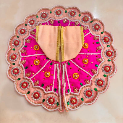Shop Bhavyaam's Kusum Vilas Shringar Poshak for Ladoo Gopal Ji. Handcrafted pearl and kundan designer dress with matching mukut, perfect for Janmashtami, daily seva, and festive shringar.