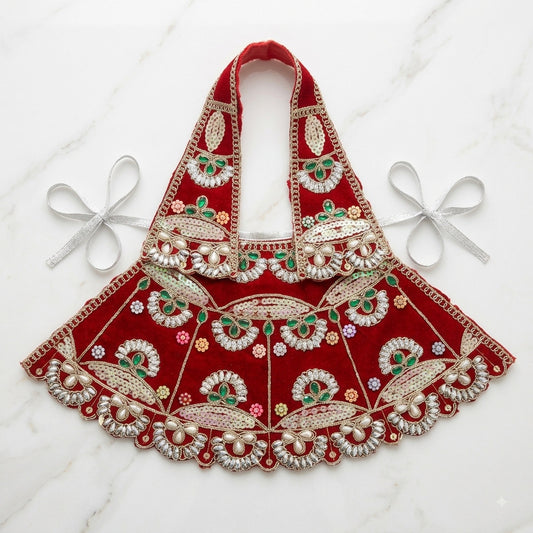 Bhavyaam handcrafted Lal Lavanya crimson red Mata Rani lehenga patka set with pearl moti work, emerald green stone embellishments, and crystal scalloped border for Navratri and Devi shringar.