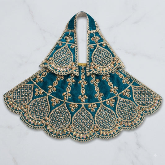 Bhavyaam handcrafted Mayur Swarna peacock teal blue Mata Rani lehenga patka set with golden teardrop beads and scalloped rhinestone kalash motifs for Navratri and Durga Puja.