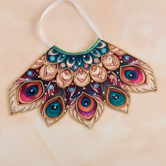 Bhavyaam Mayur Vaibhav handcrafted Lehnga Patka set for Mata Rani, Lakshmi Ji and Ganesh Ji featuring a peacock feather inspired design with stone embellishments and festive shringar.