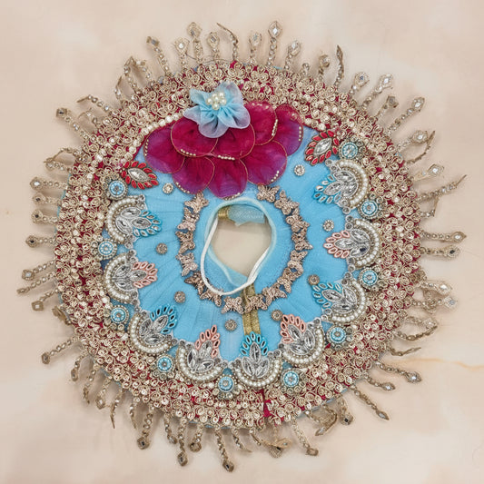 Bhavyaam Neelkamal handcrafted sky blue and rani pink Laddu Gopal Ji poshak with pearl, kundan and stone work and matching designer Mukut for Janmashtami and Jhulan Yatra.