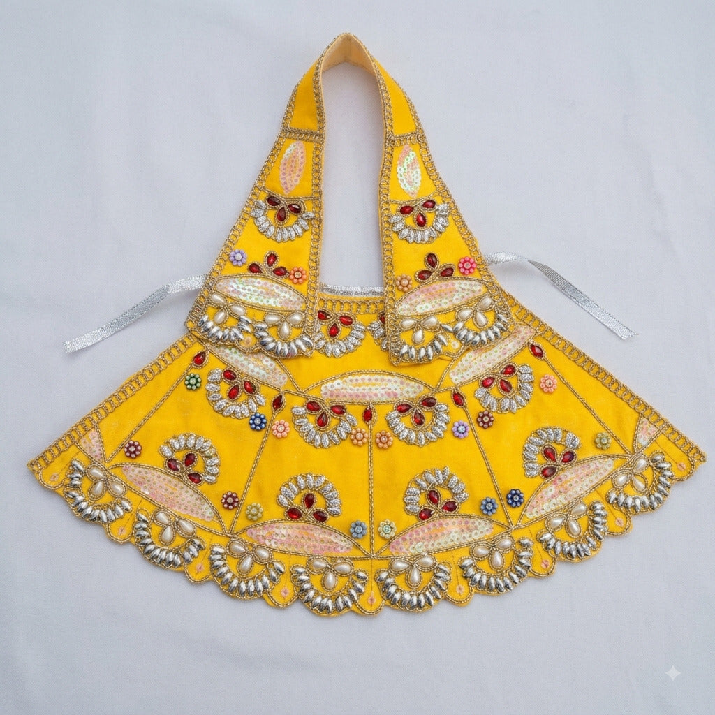 Bhavyaam handcrafted Pitambari Lavanya yellow Mata Rani lehenga patka set with pearl moti work, ruby stone embellishments, and crystal scalloped border for Vasant Panchami and Devi shringar.