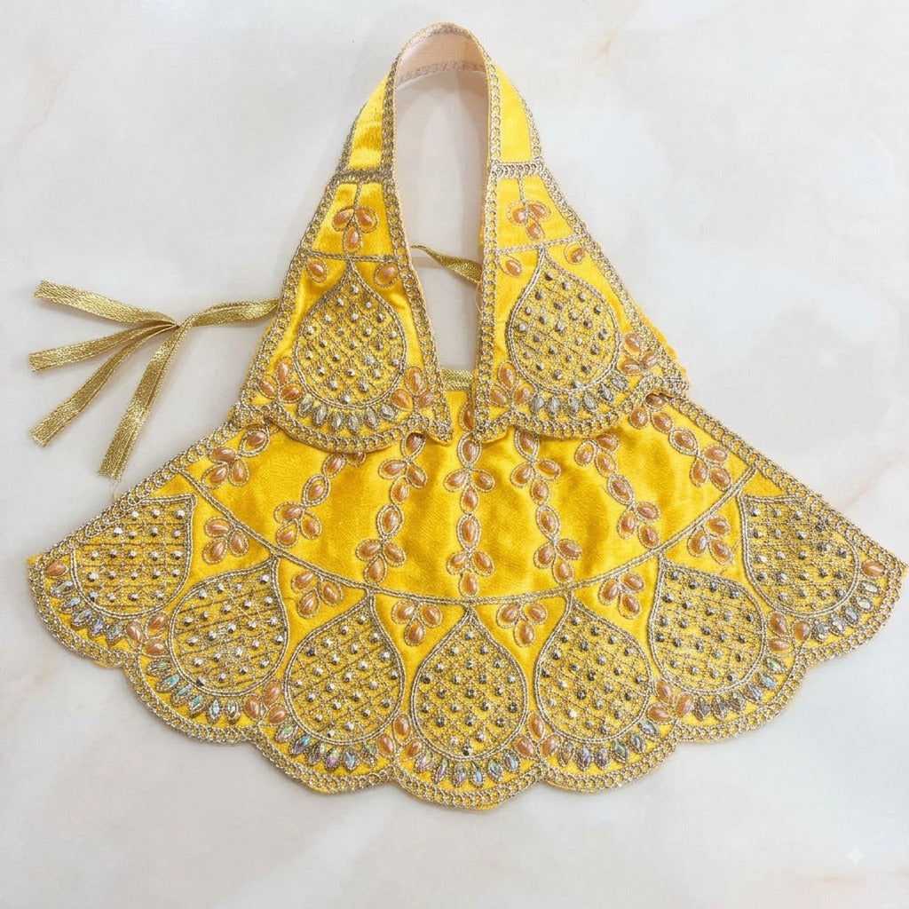 Bhavyaam handcrafted Pitambari Swarna yellow Mata Rani lehenga patka set with golden teardrop beads and scalloped rhinestone kalash motifs for Vasant Panchami and Devi shringar