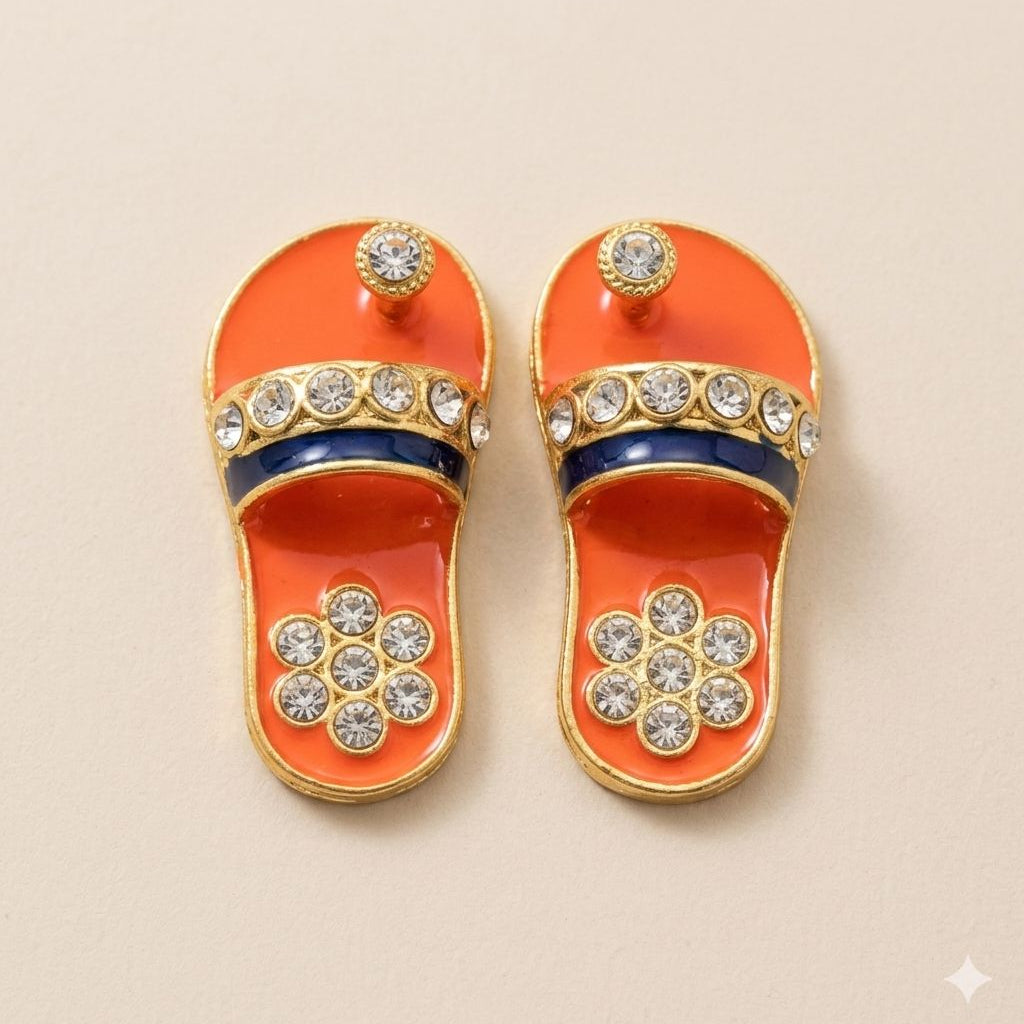 Designer emerald and ruby-red enamel charan paduka for Ladoo Gopal Ji with crystal floral embellishments