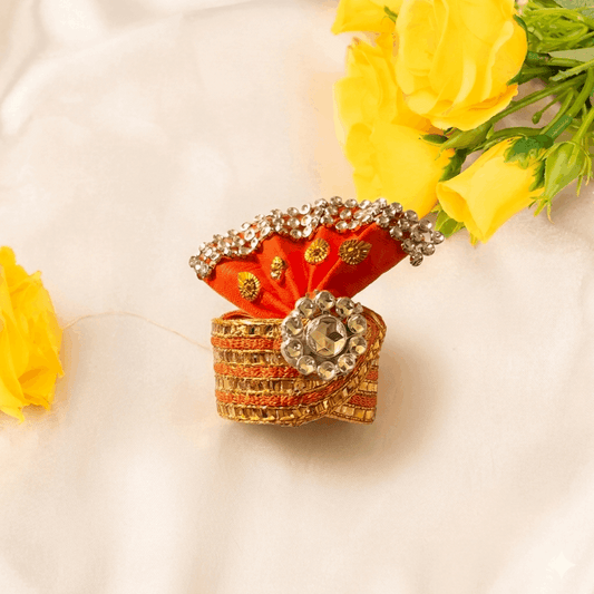 Decorative headband with crystals and ribbons on a white background with yellow flowers.