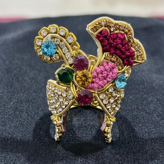 Vibrant multi-colored stone designer mukut for Ladoo Gopal Ji with floral threadwork and gold detailing.