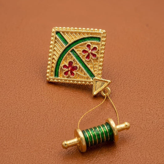 Patang Utsav miniature kite and charkhi set for Ladoo Gopal Ji, featuring gold-tone finish and enamel floral accents