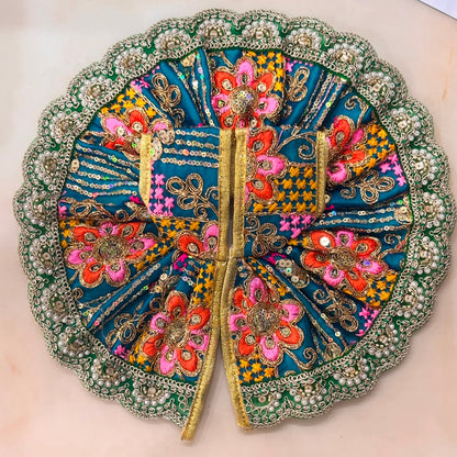 Handcrafted vibrant  teal green designer dress and matching crown for Ladoo Gopal Ji, featuring multi-colored thread embroidery and pearl borders.
