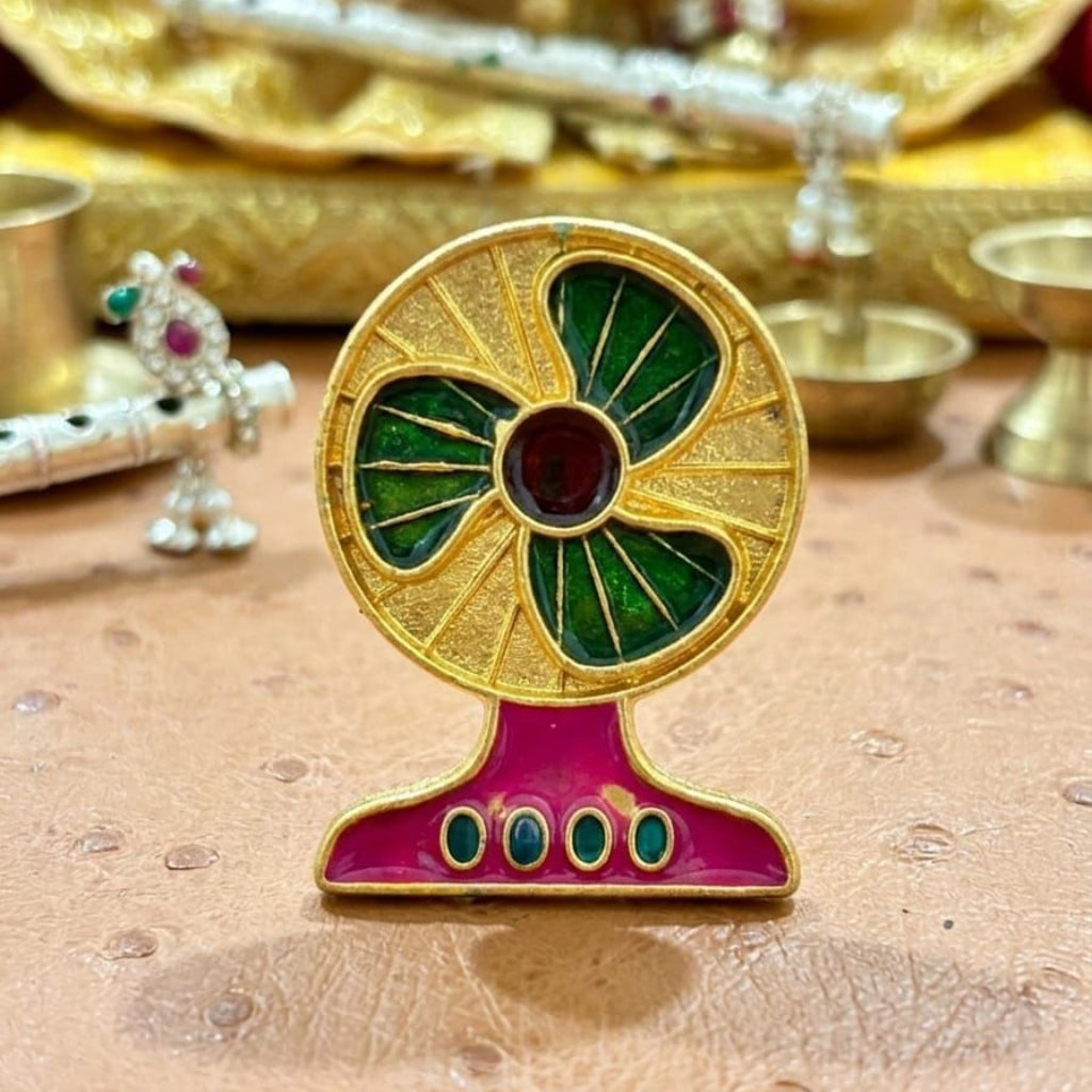 Sheetala Seva miniature table fan accessory for Ladoo Gopal Ji, featuring green, crimson, and fuchsia enamel with gold-tone finish
