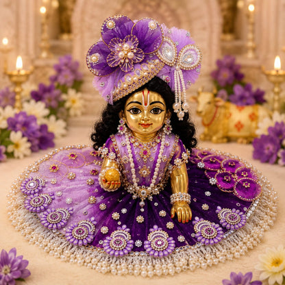 Handcrafted royal purple designer dress and matching crown for Ladoo Gopal Ji, featuring sacred cow appliqué, Krishna motifs, and pearl fringes